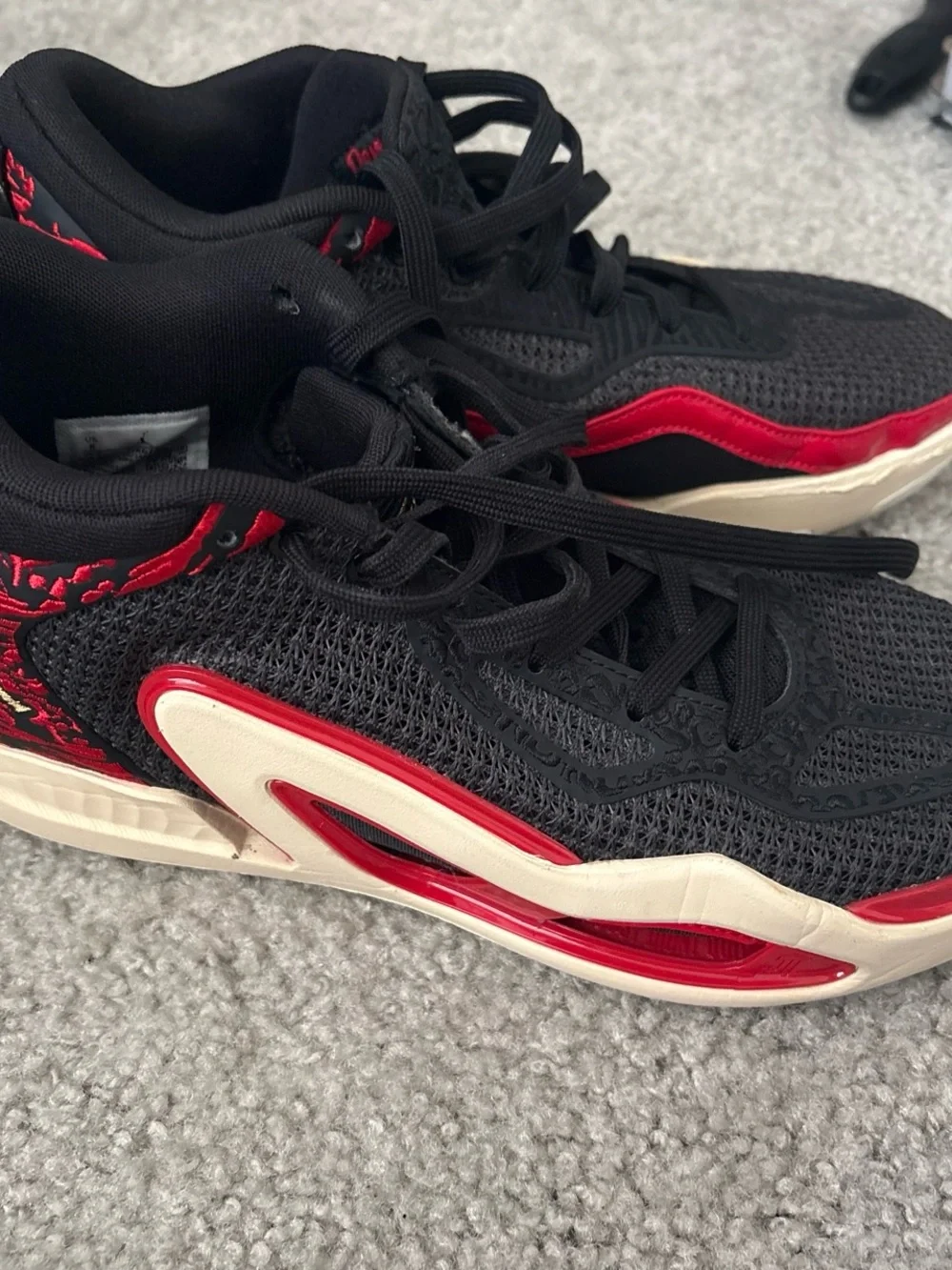 Jordan Men's Black and Red Low-Top Sneakers with Gold Logo